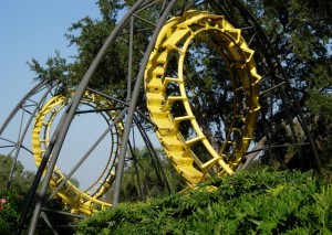 a-yellow-roller-coaster-track-set-amid-trees