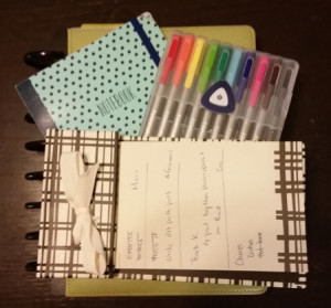 I use an Arc Junior, simple notebook with unlined pages, coloured markers, and a note pad with the daily tasks.